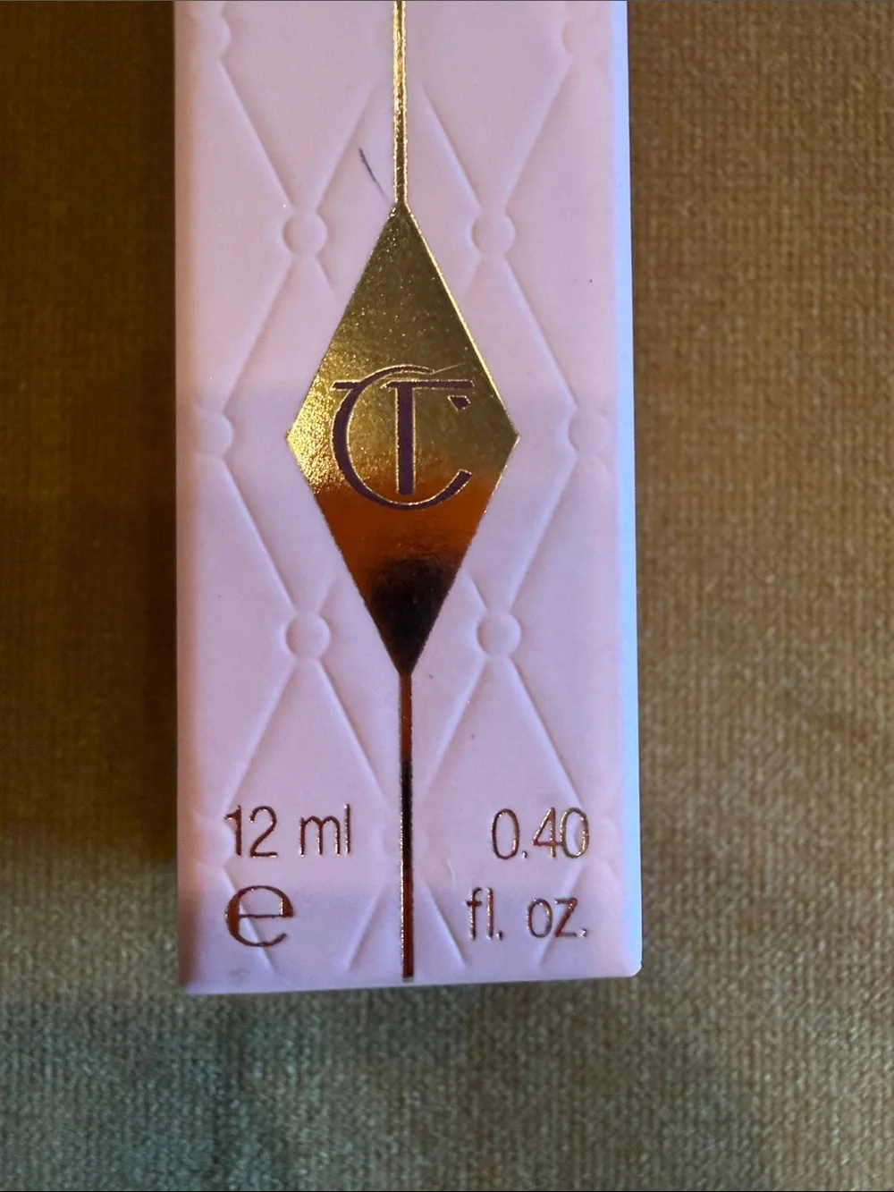 Charlotte Tilbury shade pillow